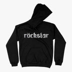 Hoodie negro con capucha y bolsillo canguro, con diseño central de la palabra "Röckstar" en tipografía gótica con textura desgastada (grunge) en color gris claro
