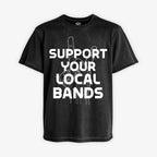 Polera negra con efecto acid wash. Diseño blanco al centro con el mensaje "Apoya Tus Bandas Locales" y la mano de rock