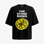 Polera oversized negra con diseño frontal de The Stone Roses, limón icónico y nombre de la banda