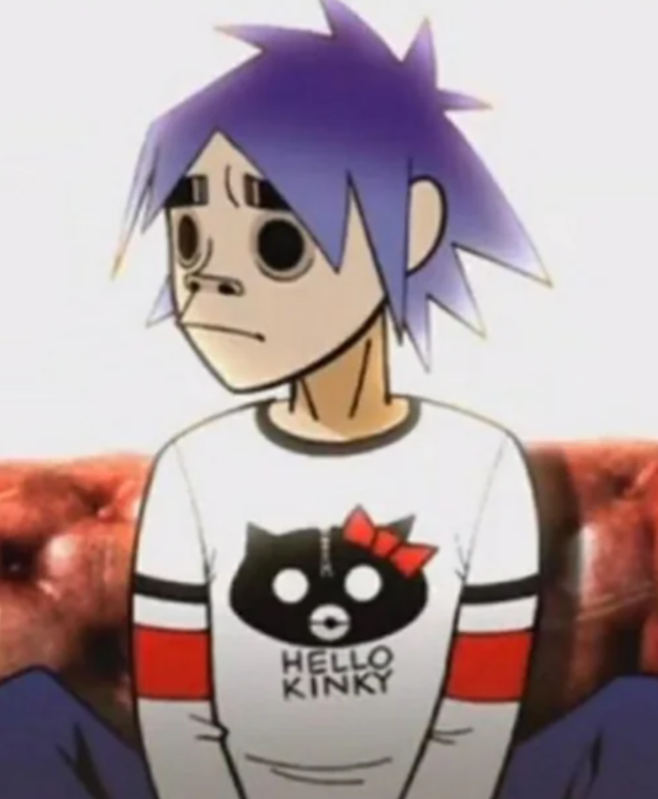 2-D de Gorillaz usando la polera Hello Kinky en los G-Bitez